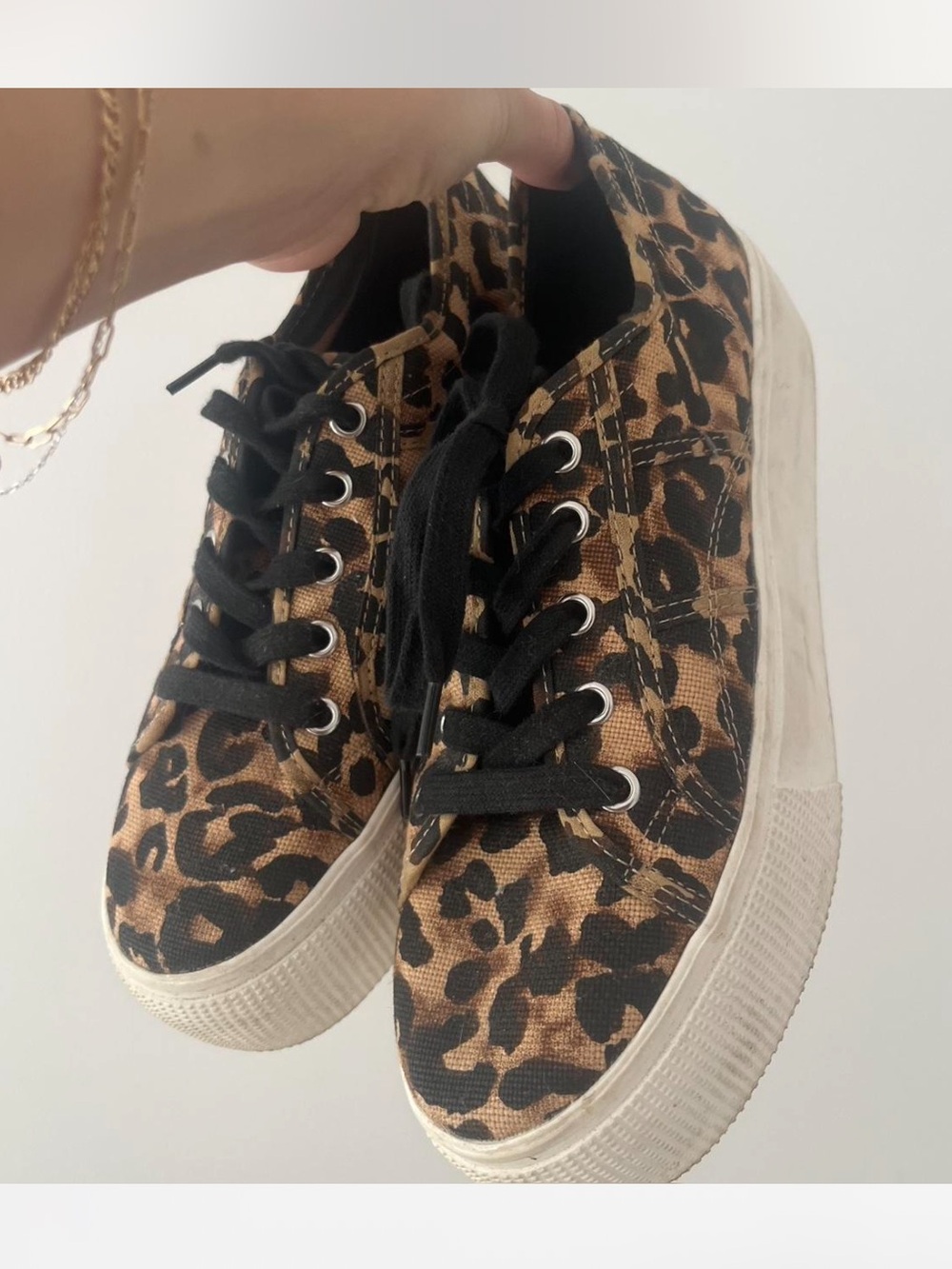 Steve Madden low top cheetah print sneaker.